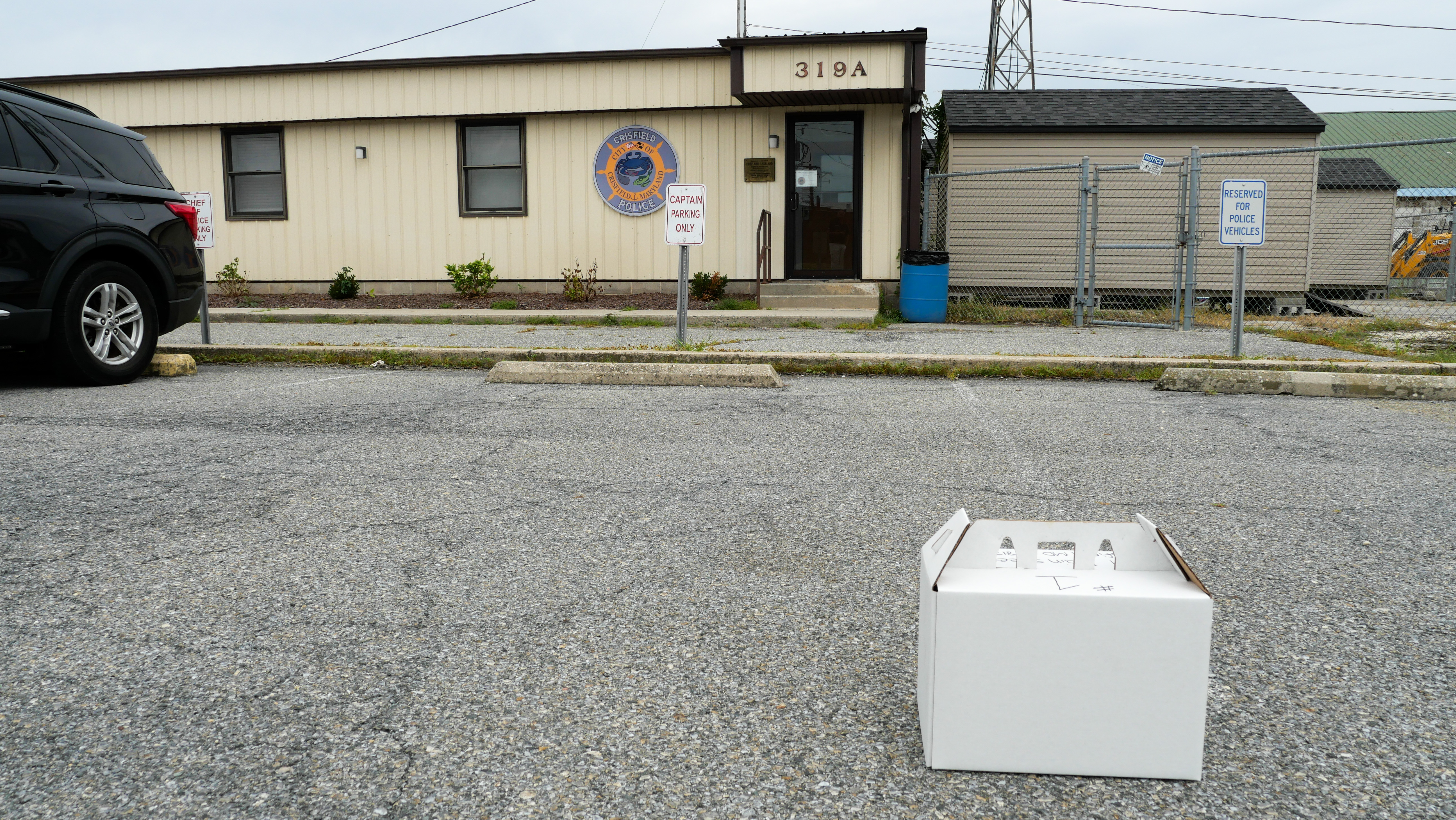 A prescription package delivered by drone awaits pickup during medical drone demonstrations.