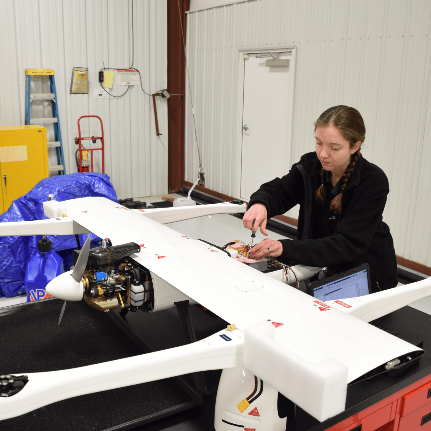 Mckenzie working on the UROC Penguin B VTOL avionics bay.